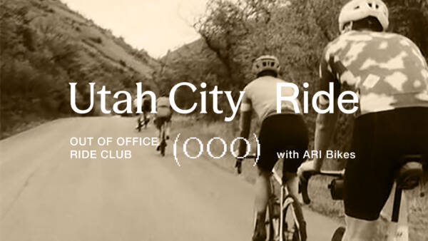 3 road bikers biking up a mountain road
